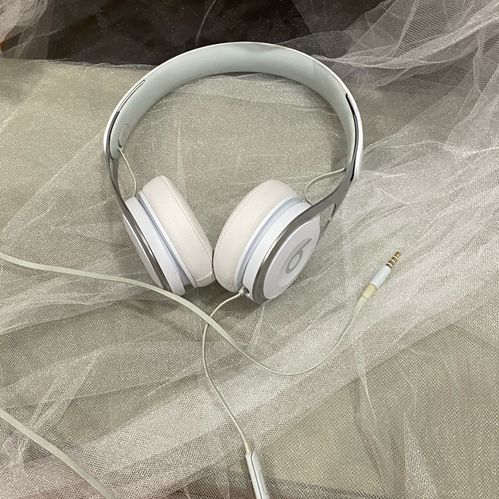 Beats headphones they are used works perfectly fine